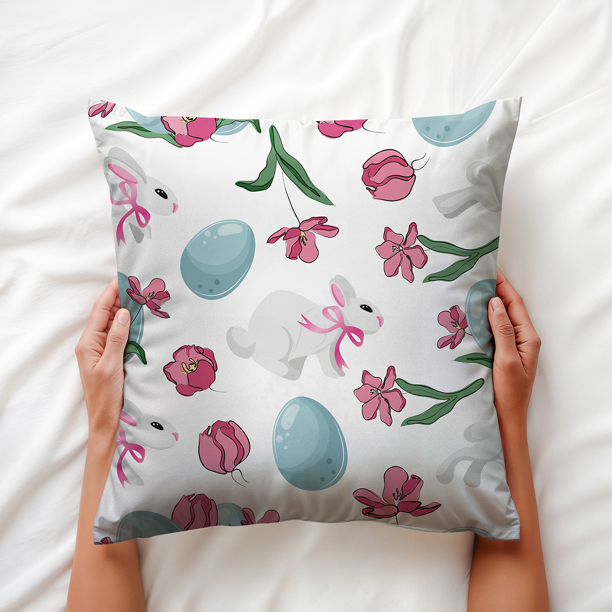 Zbliżenie na wzór z zającem w kokardce i pastelową pisanką