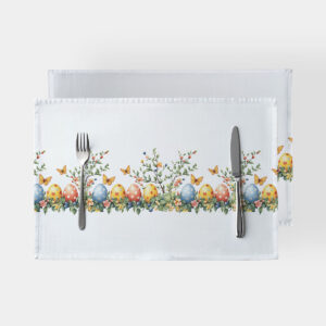 biała podkładka ze wzorem akwarelowych pisanek, gałązek i motyli, ujęcie z góry