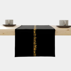 Czarny bieżnik z centralnym złotym ludowym pasem na stole