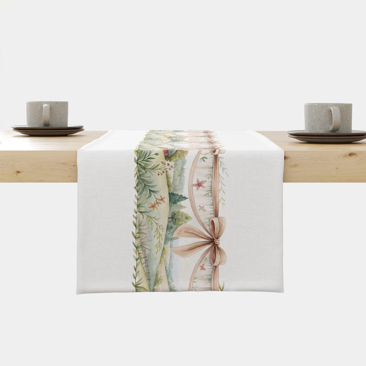 Bieżnik ułożony na stole z akwarelowym pejzażem i pastelowymi wstążkami, widok z przodu