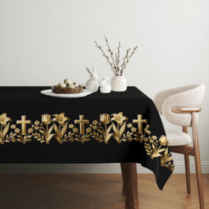 aranżacja stołu ze świątecznymi dekoracjami: koszyk z pisankami i wiosenne gałązki na obrusie