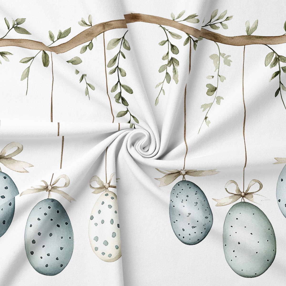 zbliżenie na detal tkaniny pokazujący akwarelowe jajka, wstążki i gałązki