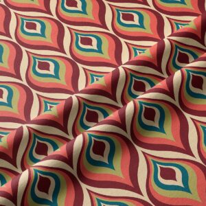 Zbliżenie na fakturę tkaniny i kolorowy wzór łezek w ciepłych odcieniach