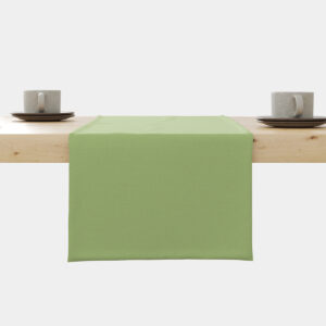 Miętowy bieżnik ułożony na drewnianym stole, widok z przodu