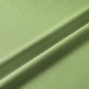 Zbliżenie na gładką strukturę miętowej tkaniny bieżnika