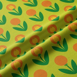 Zbliżenie na fakturę tkaniny i powtarzalny wzór stylizowanych tulipanów