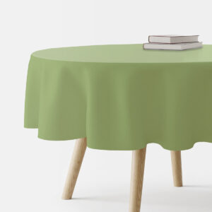 okrągły stół nakryty gładkim miętowym obrusem złożone książki na blacie