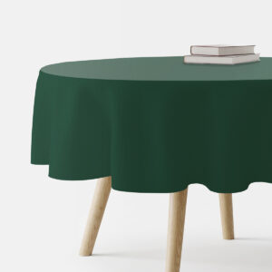 okrągły obrus w głębokiej zieleni na stoliku z drewnianymi nogami