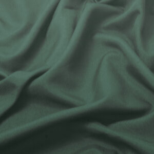 detal tkaniny z delikatną fakturą i miękkimi marszczeniami