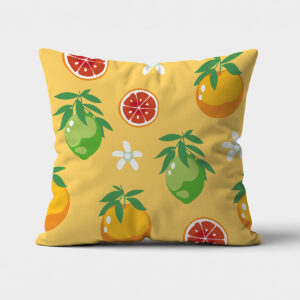 Główne ujęcie poduszki dekoracyjnej z żółtym tłem i wzorem limonek, pomarańczy i plastrów grejpfruta