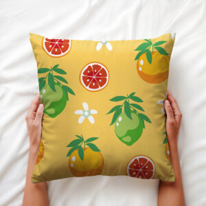 Zbliżenie na strukturę tkaniny i detal ilustracyjnych owoców oraz białych kwiatów